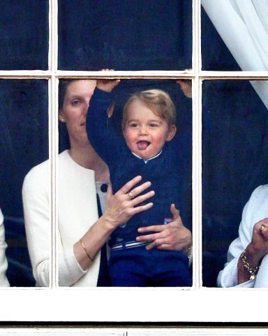 Prince George at the window of Buckingham Palace with nanny Maria Teresa Turrion Borrallo Trooping the Colour ceremony, London, Britain - 13 Jun 2015