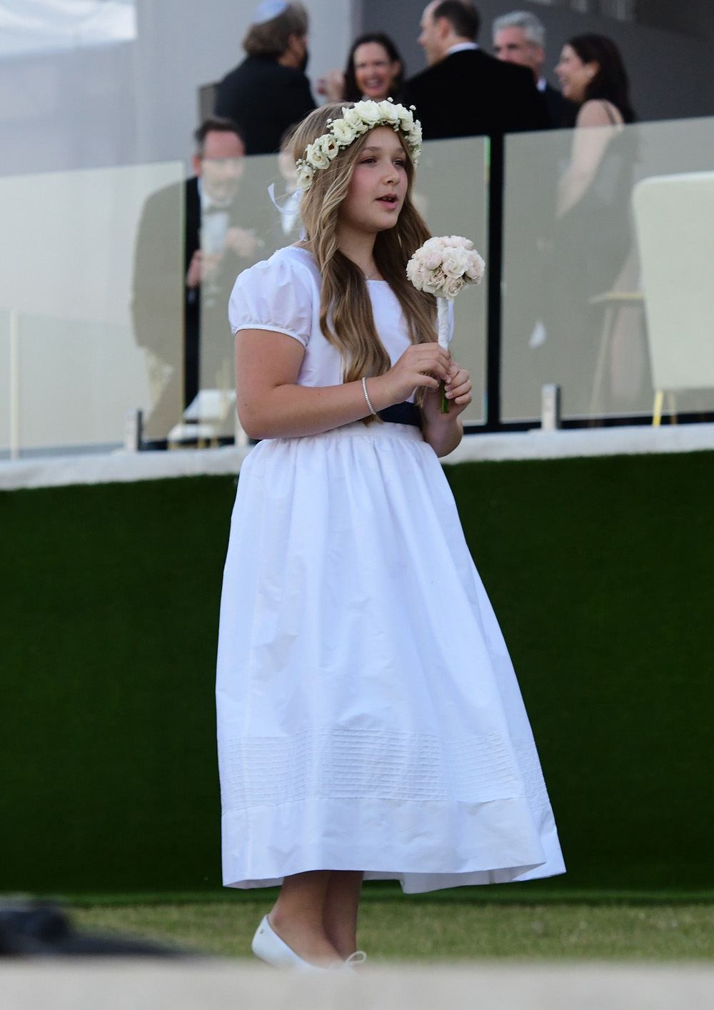 Harper Beckham is seen in her flower girl dress for her brother Brooklyn Beckham and Nicola Peltz wedding in Palm Beach, Florida. 09 Apr 2022 Pictured: Harper Beckham. Photo credit: Backgrid/MEGA TheMegaAgency.com +1 888 505 6342 (Mega Agency TagID: MEGA846299_011.jpg) [Photo via Mega Agency]