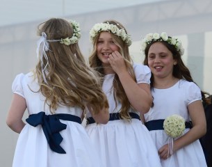 Harper Beckham is seen in her flower girl dress for her brother Brooklyn Beckham and Nicola Peltz wedding in Palm Beach, Florida. 09 Apr 2022 Pictured: Harper Beckham. Photo credit: Backgrid/MEGA TheMegaAgency.com +1 888 505 6342 (Mega Agency TagID: MEGA846299_001.jpg) [Photo via Mega Agency]