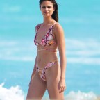 Victoria Secret Model Taylor Hill Hits The Beach In Several Bikinis