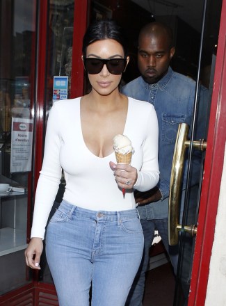 Kim Kardashian and Kanye West get ice cream at Haagen-Dazs
Kim Kardashian and Kanye West out and about, Paris, France - 18 May 2014
