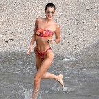 Bella Hadid shows off her incredible physique on a tiny bikini in St Barths