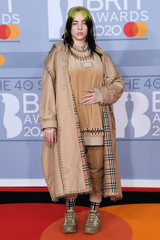 Stars In Trench Coats: Billie Eilish & more