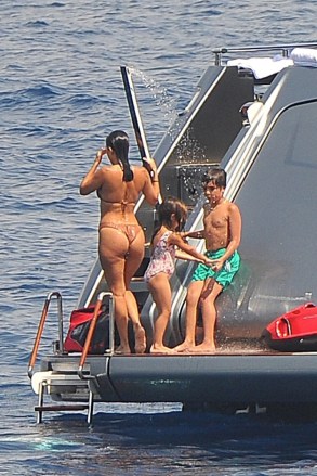 ** RIGHTS: ONLY UNITED STATES, BRAZIL, CANADA ** Portofino, ITALY - Kourtney Kardashian has fun at sea with her children as she continues her vacation in Portofino. While her mom Kris Jenner explores the little village with boytoy Corey Gamble, Kourtney takes her two oldest, Mason and Penelope, for some fun on the ocean. Kourtney showed off her curves in a barely-there beige bikini as they frolicked on a boat with friends. Kourtney and Mason showed off a bit as they jumped off the boat into the water.Pictured: Kourtney KardashianBACKGRID USA 8 JULY 2018 BYLINE MUST READ: Cucu / BACKGRIDUSA: +1 310 798 9111 / usasales@backgrid.comUK: +44 208 344 2007 / uksales@backgrid.com*UK Clients - Pictures Containing ChildrenPlease Pixelate Face Prior To Publication*