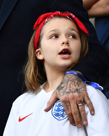 Editorial use onlyMandatory Credit: Photo by Javier Garcia/BPI/Shutterstock (10323675cb)Harper Beckham with David's tattooed hand next to the England badgeNorway v England, FIFA Women's World Cup 2019, Quarter Final, Football, Stade Oceane, Le Havre, France - 27 Jun 2019