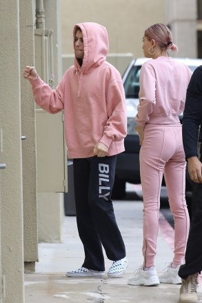 Encino, CA  - Seeing Pink! Matching duo Justin Bieber and Hailey Baldwin pictured arriving at West Valley Medical Center along with their bodyguard. The couple stepped out in matching bubblegum pink.Pictured: Justin Bieber, Hailey Baldwin BACKGRID USA 15 JANUARY 2019 BYLINE MUST READ: Vasquez-Max Lopes / BACKGRIDUSA: +1 310 798 9111 / usasales@backgrid.comUK: +44 208 344 2007 / uksales@backgrid.com*UK Clients - Pictures Containing ChildrenPlease Pixelate Face Prior To Publication*