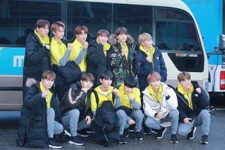 Members of South Korean boy group SEVENTEEN pose before departure for the 14th MBC Idol Star Athletics Championships 2018 in Seoul, South Korea, 15 January 2018.