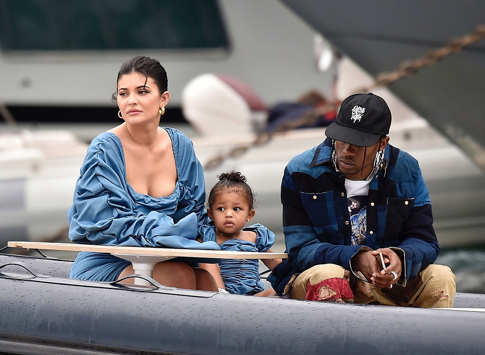 ** RIGHTS: ONLY UNITED STATES, BRAZIL, CANADA ** Portofino, ITALY  - *EXCLUSIVE*  - Kylie Jenner enjoys the day with her adorable daughter Stormy wearing matching denim ruffled dresses by TLZ L'FEMME in Portofino with family. Birthday girl Kylie and Stormy take in the sights with daddy Travis Scott, Scott Disick, Sofia Richie and her mother Kris Jenner and Corey Gamble. The gang arrive at shore via a dinghy ride and strolled through the coastal town of Portofino and turned a few heads with a variety of striking outfits as they go shopping all looking rather glammed up on their Italian break. *Shot on 08/12/19*

Pictured: Kylie Jenner - Travis Scott

BACKGRID USA 13 AUGUST 2019 

BYLINE MUST READ: Cobra Team / BACKGRID

USA: +1 310 798 9111 / usasales@backgrid.com

UK: +44 208 344 2007 / uksales@backgrid.com

*UK Clients - Pictures Containing Children
Please Pixelate Face Prior To Publication*