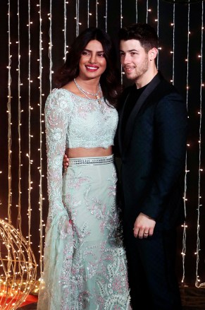 Bollywood actress Priyanka Chopra and musician Nick Jonas pose for a photo at their wedding reception in Mumbai, India Chopra Jonas Wedding, Mumbai, India - December 20, 2018