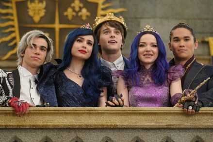 DESCENDANTS 3 - This highly anticipated third installment in the global hit Disney Channel Original Movie franchise continues the contemporary saga of good versus evil as the teenage daughters and sons of Disney's most infamous villains-Mal, Evie, Carlos and Jay (also known as the villain kids or VKs)-return to the Isle of the Lost to recruit a new batch of villainous offspring to join them at Auradon Prep. When a barrier breach jeopardizes the safety of Auradon during their departure off the Isle, Mal resolves to permanently close the barrier, fearing that nemeses Uma and Hades will wreak vengeance on the kingdom. Despite her decision, an unfathomable dark force threatens the people of Auradon and it's up to Mal and the VKs to save everyone in their most epic battle yet. "Descendants 3" is set to premiere on FRIDAY, AUG. 2 (8:00-10:00 p.m. EDT), on Disney Channel and DisneyNOW. (Disney Channel/David Bukach)CAMERON BOYCE, SOFIA CARSON, MITCHELL HOPE, DOVE CAMERON, BOOBOO STEWART