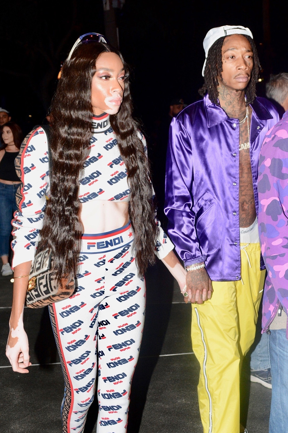 Winnie Harlow and Wiz Khalifa arrive hand in hand to the Lakers Game