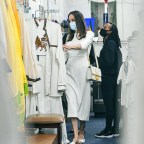 Angelina Jolie wears all white as she takes her kids Zahara and Shiloh shopping at an Ethiopian boutique in Los Angeles
