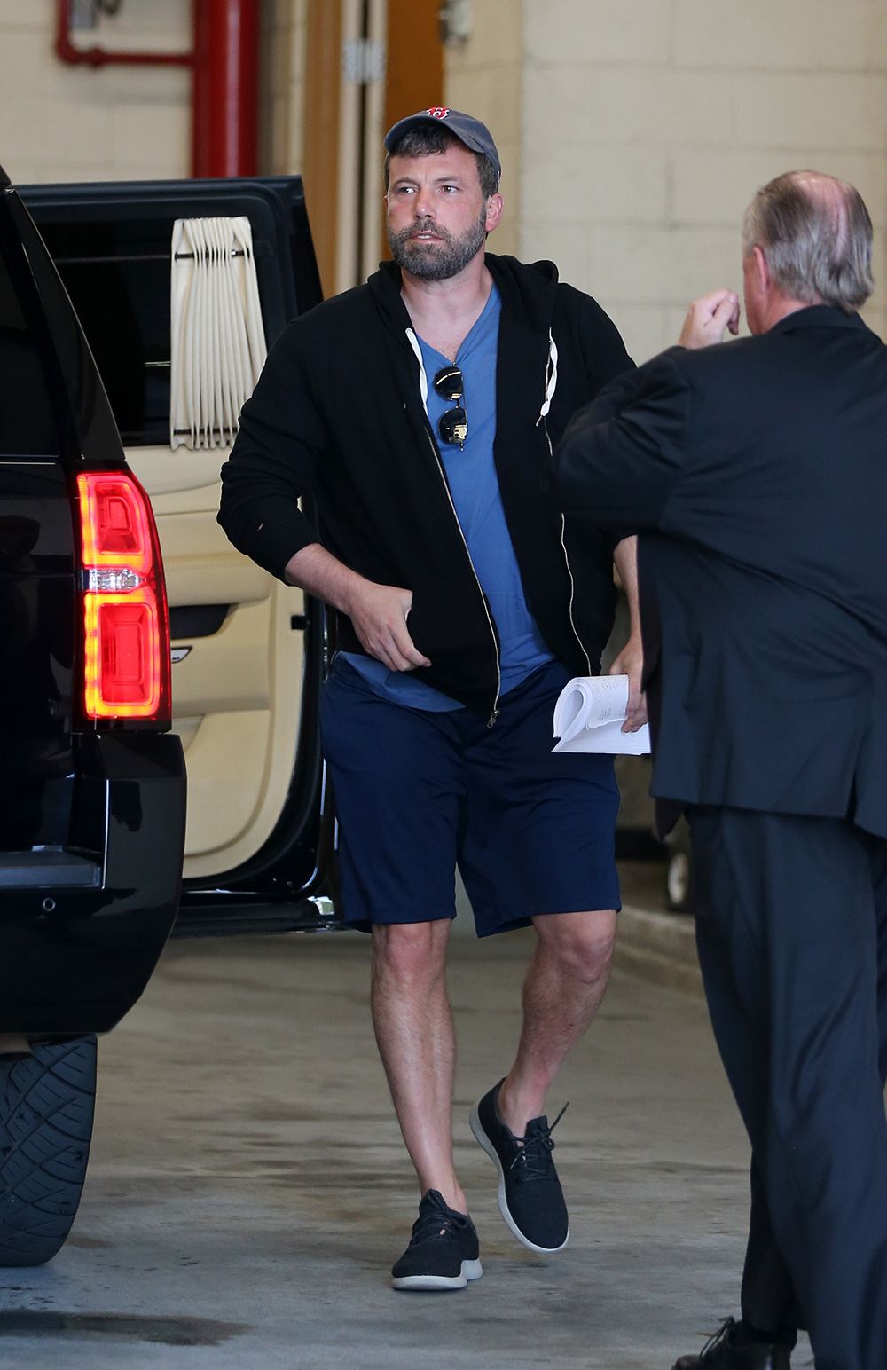 Ben Affleck back to work as he holds a script walking into Warner Brothers studio