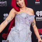 I Can't Tell Where Cardi B's Extra-Long Hair Begins and Her Cape Dress Ends  — See the Photos