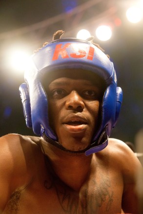 KSI stares out at the crowd ahead of his fight with Logan Paul
Logan Paul v KSI, Boxing match, Manchester Arena, UK - 25 Aug 2018
The two internet celebrities have been feuding for months online. The fight is seen as a victory for youtube, the fight livestreamed to millions online.