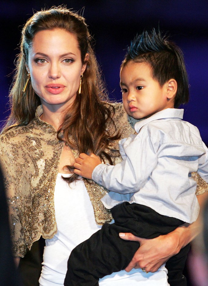 Angelina Jolie has son Maddox by her side as she leaves Washington DC