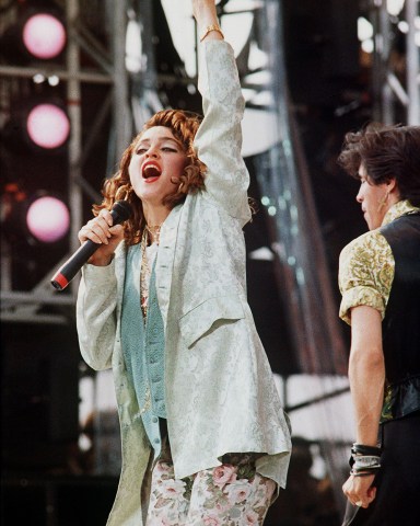 Actress and singer Madonna sings on stage at the JFK Stadium in Philadelphia, Pa., during the Live Aid concert LIVE AID PHILADELPHIA 1985, PHILADELPHIA, USA