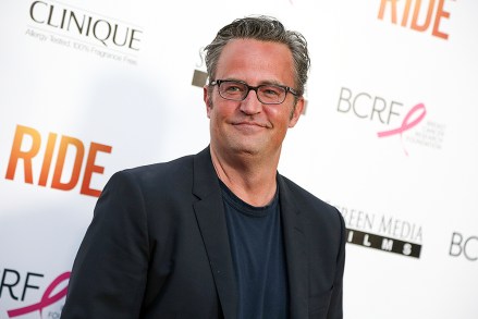 FILE - In this April 28, 2015, file photo, Matthew Perry arrives at the LA Premiere of "Ride" in Los Angeles. The former "Friends" star appears with Katie Holmes, who reprises her role as Jackie Kennedy in "The Kennedys After Camelot,” which premieres on the Reelz channel on April 2. (Photo by Rich Fury/Invision/AP, File)