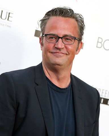 FILE - In this April 28, 2015, file photo, Matthew Perry arrives at the LA Premiere of "Ride" in Los Angeles. The former "Friends" star appears with Katie Holmes, who reprises her role as Jackie Kennedy in "The Kennedys After Camelot,” which premieres on the Reelz channel on April 2. (Photo by Rich Fury/Invision/AP, File)