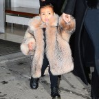 Kim Kardashian and North West wear giant fur coats in NYC