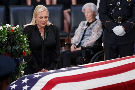 Meghan McCain takes a moment at the casket of her husband Senator John McCain after a memorial service in the Rotunda, where he will lie in state for the rest of the day in Washington, DC, USA, 31 August 2018. McCain will lie in state at the US Capitol and have a funeral service at the National Cathedral before being laid to rest at the US Naval Academy in Annapolis, Maryland. McCain died 25 August, 2018 from brain cancer at his ranch in Sedona, Arizona, USA. He was a veteran of the Vietnam War, served two terms in the US House of Representatives, and was elected to five terms in the US Senate. McCain also ran for president twice, and was the Republican nominee in 2008.
Senator John McCain lies in state at US Capitol, Washington, USA - 31 Aug 2018