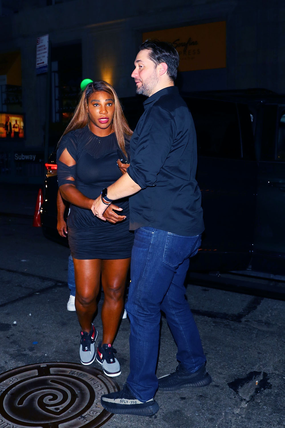 Serena Williams tries to avoid fans and Maxwell arriving at an NYFW event in NYC