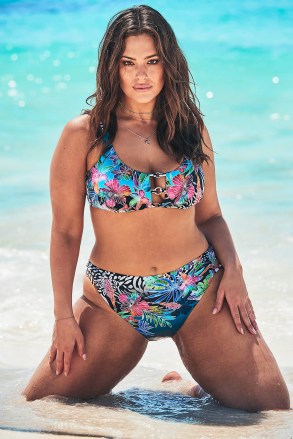 Ashley Graham proudly shows off her voluptuous figure alongside her sister in the new Swimsuits For All summer collection. The 31-year-old plus-size model is joined by her younger sister Abigail in the summery beach photoshoot, where the pair are seen cavorting together in the surf. The new capsule collection celebrates the ‘immeasurable relationship, unconditional support, and encouragement that is shared among Ashley and her sister Abigail,’ according to the brand and the campaign was shot on the beaches of Punta Cana, in the Dominican Republic. The campaign captures their sisterly bond through a series of "then and now" family photos, traveling back in time to their adolescence. Ashley said: ’Despite our six-year age difference and busy lifestyles, my little sister and I have always been strong presences in each other's lives. We've shared countless memories together and going through our childhood photos was a trip down memory lane. ‘Abigail has always been my rock, and I was honored to have her by my side during this photoshoot. Plus, she's a new mom and has never looked hotter in a swimsuit!’ Abigail was also thrilled to model alongside Ashley. ‘I love to support Ashley in everything she does, especially when it comes to promoting her message of beauty beyond size. As children, Ashley and I created a very tight bond that we have been able to carry over to adulthood. ‘Every summer, we would go on road trips together to different states. I'll never forget Ashley getting stung by jellyfish in Florida. It was hilarious! I'll forever be grateful for the sisterly love we have for one another and will never forget the special moments we shared during the photoshoot in Punta Cana," says Abigail. The nine-piece swim collection features mesh panels, netting, exotic florals and animal prints. Styles to highlight include the Phenom Triangle Monkini, Red Orange Heiress High Waist Bikini, and Gala One Shoulder One Piece. Retailing under $104, the As