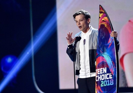 Louis Tomlinson accepts the award for choice male artist at the Teen Choice Awards at The Forum, in Inglewood, Calif2018 Teen Choice Awards - Show, Inglewood, USA - 12 Aug 2018