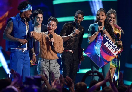 Nick Cannon, Lele Pons, Diego Tinoco, Jason Genao, Brett Gray, Sierra Capri. Hosts Nick Cannon, left, and Lele Pons, right, present the award for choice breakout TV for the show to, from second left, Diego Tinoco, Jason Genao, Brett Gray and Sierra Capri for "On My Block" at the Teen Choice Awards at The Forum, in Inglewood, Calif2018 Teen Choice Awards - Show, Inglewood, USA - 12 Aug 2018