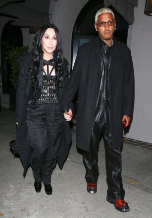 West Hollywood, CA - New Partner Alert?  Cher and Amber Rose's ex, Alexander Edwards, is seen holding hands at Craig's in West Hollywood.  Later, the couple went to The Nice Guy nightclub with Tyga!  Pictured: Cher, Alexander Edwards BACKGRID USA NOVEMBER 3, 2022 USA: +1 310 798 9111 / usasales@backgrid.com UK: +44 208 344 2007 / uksales@backgrid.com *Customers From the UK: Images containing children, please pixelate the face before posting *