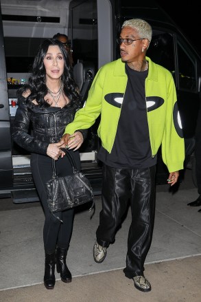 Scottsdale, AZ  - Cher and beau Alexander Edwards attend Drake's Super Bowl party at Hanger 1 in Scottsdale ahead of Superbowl LVII.Pictured: Alexander Edwards, AE, CherBACKGRID USA 10 FEBRUARY 2023 BYLINE MUST READ: The Daily Stardust / BACKGRIDUSA: +1 310 798 9111 / usasales@backgrid.comUK: +44 208 344 2007 / uksales@backgrid.com*UK Clients - Pictures Containing ChildrenPlease Pixelate Face Prior To Publication*