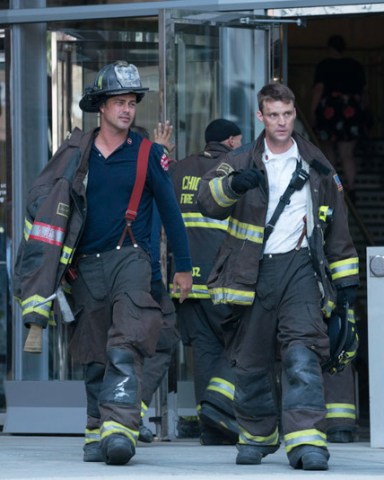 CHICAGO FIRE -- "A Closer Eye" Episode 701 -- Pictured: (l-r) Taylor Kinney as Kelly Severide, Jesse Spencer as Matthew Casey -- (Photo by: Elizabeth Sisson/NBC)