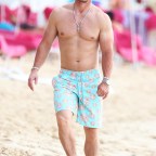 *EXCLUSIVE* Mark Wahlberg enjoys another day at the beach while on his annual family holiday in Barbados!