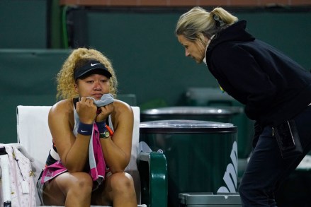 Naomi Osaka, left, of Japan, talks with an official while reacting to a comment from a spectator during her match with Veronika Kudermetova, of Russia, at the BNP Paribas Open tennis tournament, in Indian Wells, Calif
Tennis, Indian Wells, United States - 12 Mar 2022
