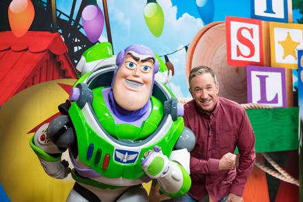 Tim Allen strikes a pose with Buzz Lightyear after taping an interview for Toy Story Land
Tim Allen at Toy Story Land, Walt Disney World, Orlando, USA - 26 Apr 2018
Toy Story Land opening June 30 at Disney's Hollywood Studios. In the new land, Walt Disney World Resort guests will 'shrink' to the size of a toy to explore Andy's backyard, ride the Slinky Dog Dash coaster, go for a spin on Alien Swirling Saucers and experience 4D carnival midway games on Toy Story Mania