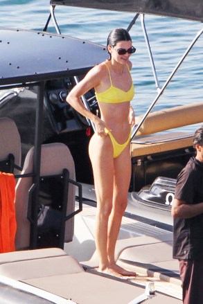 Kendall Jenner in yellow bikini sighted on a speed boat to have fun with friends on Mykonos Island, Greece. 08 Jul 2019 Pictured: Kendall Jenner. Photo credit: Savio / MEGA TheMegaAgency.com +1 888 505 6342 (Mega Agency TagID: MEGA461639_021.jpg) [Photo via Mega Agency]