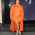 Rihanna Stuns In Orange As She Celebrates Her Fenty Pop Up Shop At Bergdorf Goodman In NYC
