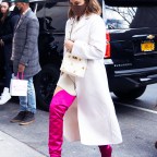 Chrissy Teigen Stuns In A White Coat And Neon Pink Thigh High Boots While Out In NYC