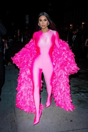 Kim Kardashian swoons in a hot pink feathered catsuit as she celebrates her first hosting gig on SNL with Zero Bond. 5808 London: +44 (0)20 8126 1009 Berlin: +49 175 3764 166photodesk@splashnews.comWorld Rights