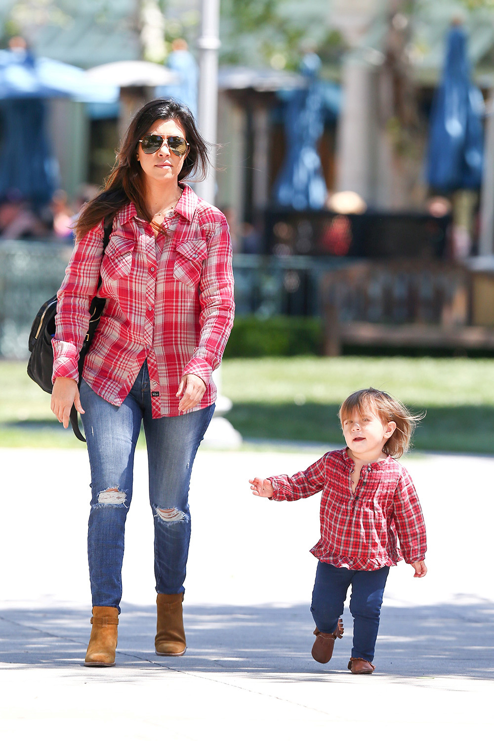 Kourtney Kardashian shows curves with daughter Penelope