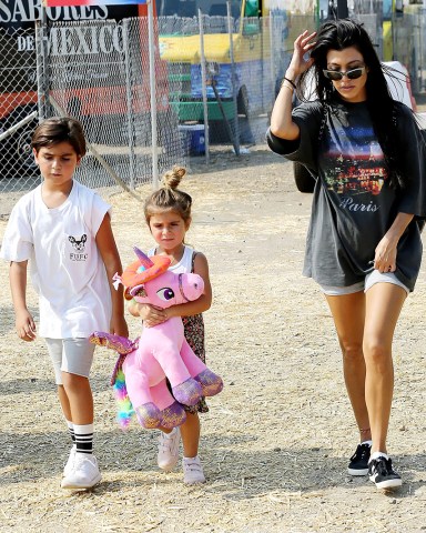 Kourtney Kardashian, Penelope Disick, Mason Disick
36th Annual Malibu Chili Cook-Off, Los Angeles, USA - 02 Sep 2017
Scott Disick steps out with mystery girl at chili festival...and nearly runs into Kourtney Kardashian at same event in Malibu