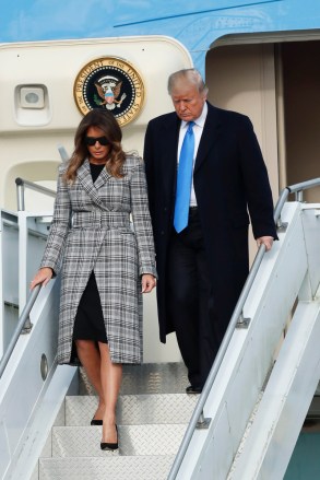 Donald Trump, Melania Trump. President Donald Trump, right, departs Air Force One as he arrives with first lady Melania Trump on in Coraopolis, Pa. The Trumps came to Pittsburgh honor the victims of the deadly shooting at a synagogue in Pittsburgh's Squirrel Hill neighborhood on Saturday
Trump, Coraopolis, USA - 30 Oct 2018