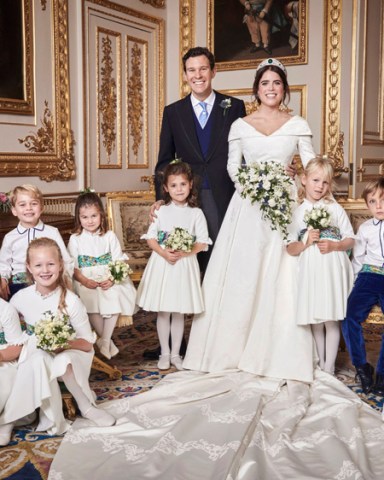 Free for Editorial Use Only. See terms of release, which must be included and passed-on to anyone to whom this image is supplied
Mandatory Credit: Photo by Alex Bramall/PA Wire/REX/Shutterstock (9930686b)
This official wedding photograph released by the Royal Communications of Princess Eugenie and Mr Brooksbank, shows - Princess Eugenie and Jack Brooksbank in the White Drawing Room, Windsor Castle with (left to right) Back row: His Royal Highness Prince George ; Her Royal Highness Princess Charlotte ; Miss Theodora Williams ; Miss Isla Phillips ; Master Louis de Givenchy Front row: Miss Mia Grace Tindall ; Miss Savannah Phillips ; Miss Maud Windsor.
The Wedding of Princess Eugenie and Jack Brooksbank, Official Portraits, Windsor, Berkshire, UK - 12 Oct 2018
News Editorial Use Only. No Commercial Use. No Merchandising, Advertising, Souvenirs, Memorabilia or Colourably Similar. Not for use after 30th April 2019 without prior permission from Buckingham Palace. No Cropping. Copyright in the photograph is vested in Princess Eugenie of York and Mr Jack Brooksbank and Alex Bramall. Publications are asked to credit the photograph to Alex Bramall. No charge should be made for the supply, release or publication of the photograph. The photograph must not be digitally enhanced, manipulated or modified in any manner or form and must include all of the individuals in the photograph when published.
