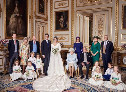 Free for editorial use only.  See terms of release, which must be included and passed-on to anyone to whom this image is supplied Mandatory Credit: Photo by Alex Bramall/PA Wire/REX/Shutterstock (9930686d) This official wedding photograph released by the Royal Communications of Princess Eugenie and Mr Brooksbank, shows - Princess Eugenie and Jack Brooksbank in the White Drawing Room, Windsor Castle with (left to right) Back row: Mr Thomas Brooksbank;  Mrs Nicola Brooksbank;  Mr George Brooksbank;  Her Royal Highness Princess Beatrice of York;  Sarah, Duchess of York;  His Royal Highness The Prince Andrew.  Middle row: His Royal Highness Prince George;  Her Royal Highness Princess Charlotte;  Queen Elizabeth II;  His Royal Highness Prince Philip;  Miss Maud Windsor;  Master Louis de Givenchy;  Front row: Miss Theodora Williams;  Miss Mia Grace Tindall;  Miss Isla Phillips;  Miss Savannah Phillips.  The Wedding of Princess Eugenie and Jack Brooksbank, Official Portraits, Windsor, Berkshire, UK - 12 Oct 2018 News Editorial Use Only.  No Commercial Use.  No Merchandising, Advertising, Souvenirs, Memorabilia or Colorably Similar.  Not for use after 30th April 2019 without prior permission from Buckingham Palace.  No cropping.  Copyright in the photograph is vested in Princess Eugenie of York and Mr. Jack Brooksbank and Alex Bramall.  Publications are asked to credit the photograph to Alex Bramall.  No charge should be made for the supply, release or publication of the photograph.  The photograph must not be digitally enhanced, manipulated or modified in any manner or form and must include all of the individuals in the photograph when published.