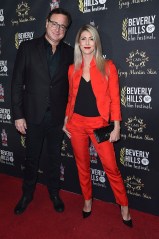 Bob Saget, Kelly Rizzo. Bob Saget, left, and Kelly Rizzo attend the Opening Night of the 2018 Beverly Hills Film Festival at the TCL Chinese 6 Theatres, in Los AngelesOpening Night of the 2018 Beverly Hills Film Festival, Los Angeles, USA - 04 Apr 2018