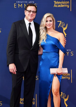 Bob Saget, Kelly Rizzo. Bob Saget, left, and Kelly Rizzo arrive at night one of the Television Academy's 2018 Creative Arts Emmy Awards at the Microsoft Theater, in Los AngelesTelevision Academy's 2018 Creative Arts Emmy Awards - Arrivals - Night One, Los Angeles, USA - 08 Sep 2018