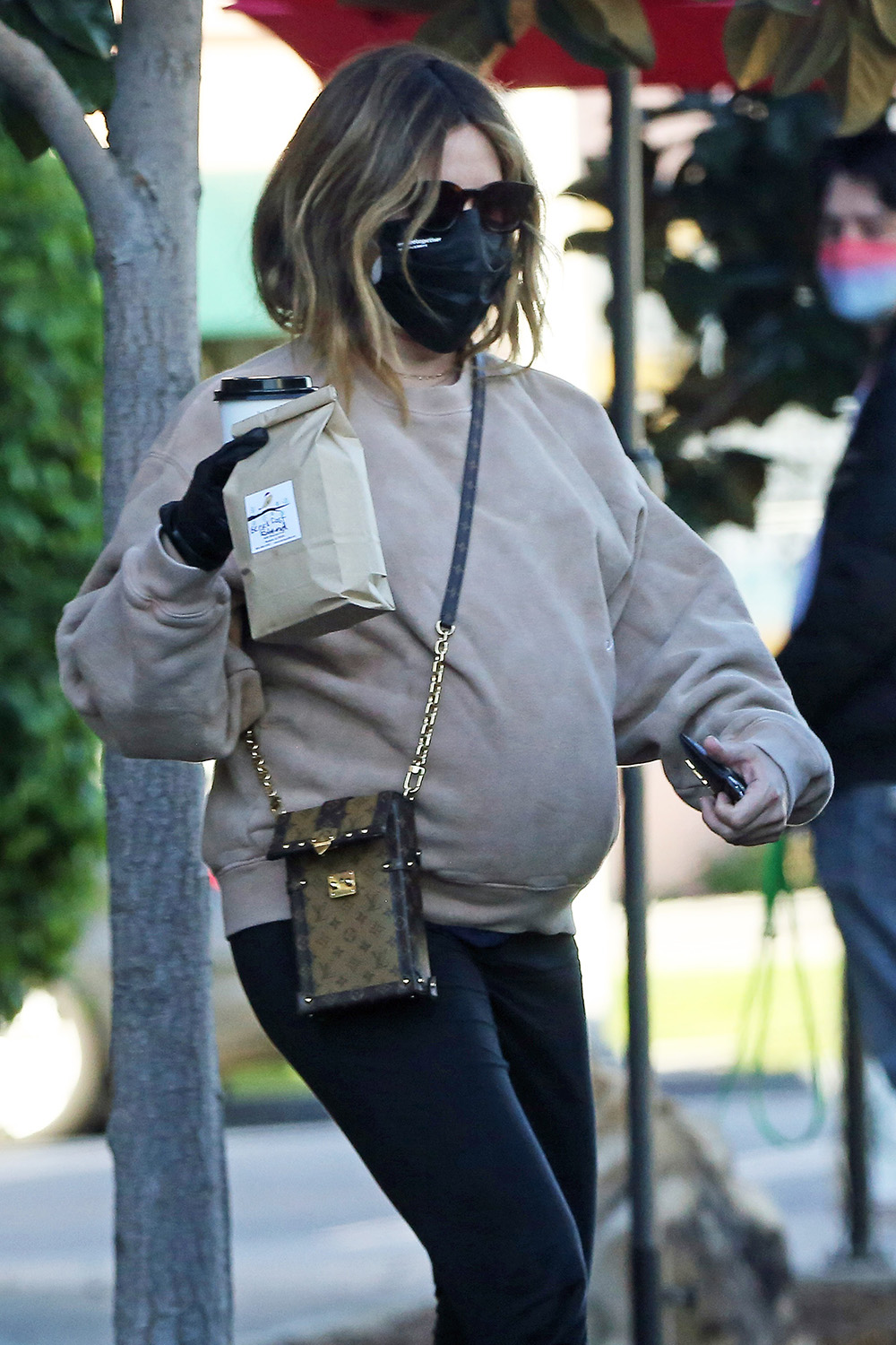 Ashley Tisdale wearing Free City Sweat Pants, Louis Vuitton