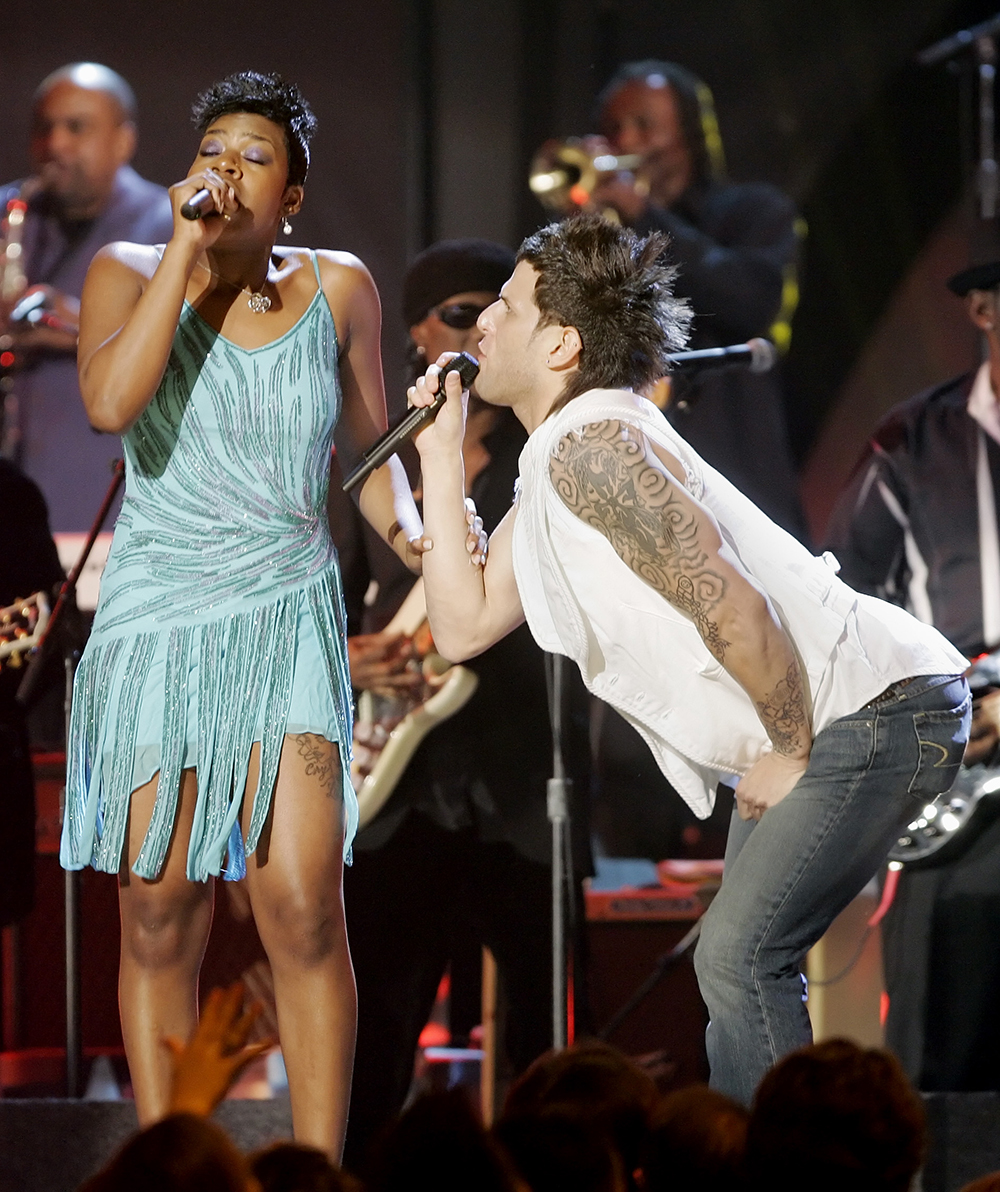 Fantasia and Devin Lima perform "If You Want Me to Stay" during a special tribute to legendary funk band Sly and the Family Stone at the 48th Annual Grammy Awards on Wednesday, Feb. 8, 2006, in Los Angeles. (AP Photo/Mark J. Terrill)