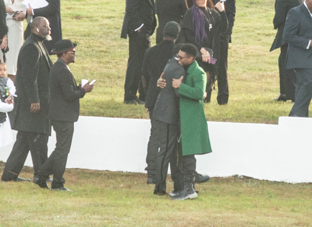 Tragic Kim Porter's golden casket spotted at graveyard as Sean 'Diddy' Combs, Usher and mourners gather.