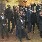 Sean 'Diddy' Combs and star-studded crowd of mourners gather to watch fireworks at Kim Porter's burial in Georgia.